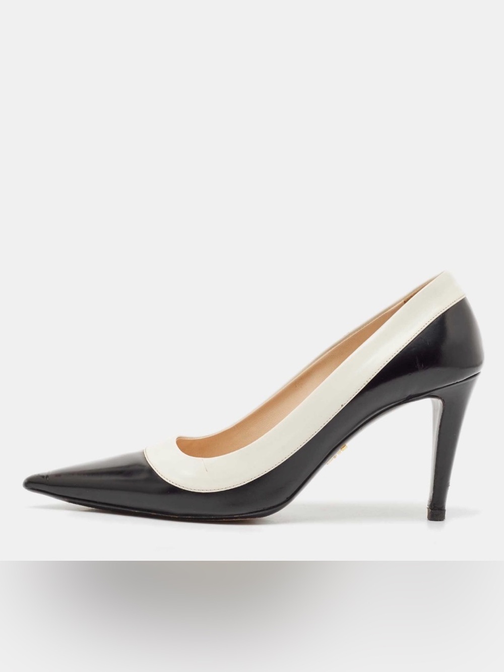 BCBGeneration Black Patent Pointed-Toe Pumps with Cream Trim